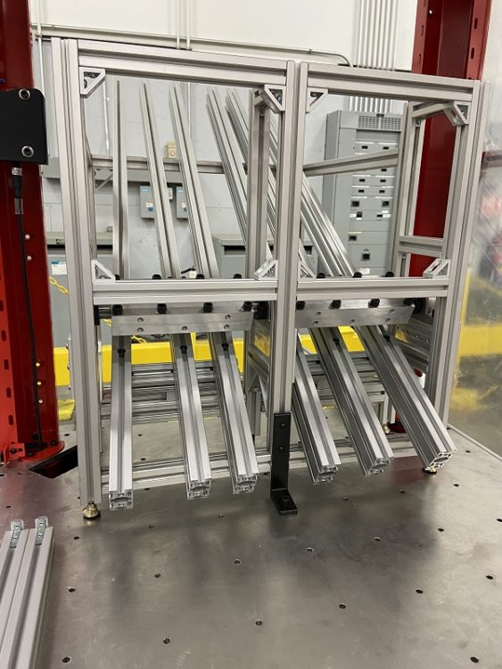 Simple parts slide with a pneumatic parts release for Cobot
