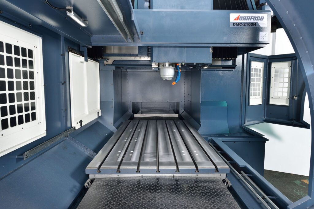 Dmc 2100H On Factory Floor Full Shot Of Interior Table With Side Enclosure Open